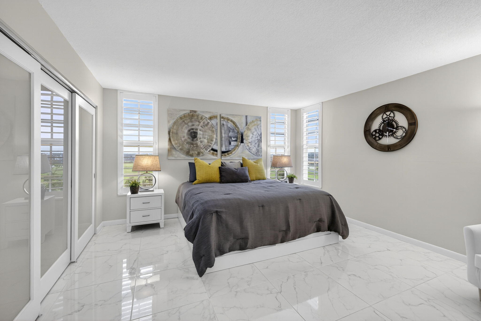 3091 North Course Drive, Unit 710 Pompano Beach, FL 33069 - Photo 26 of 46 a bedroom with a bed and a window