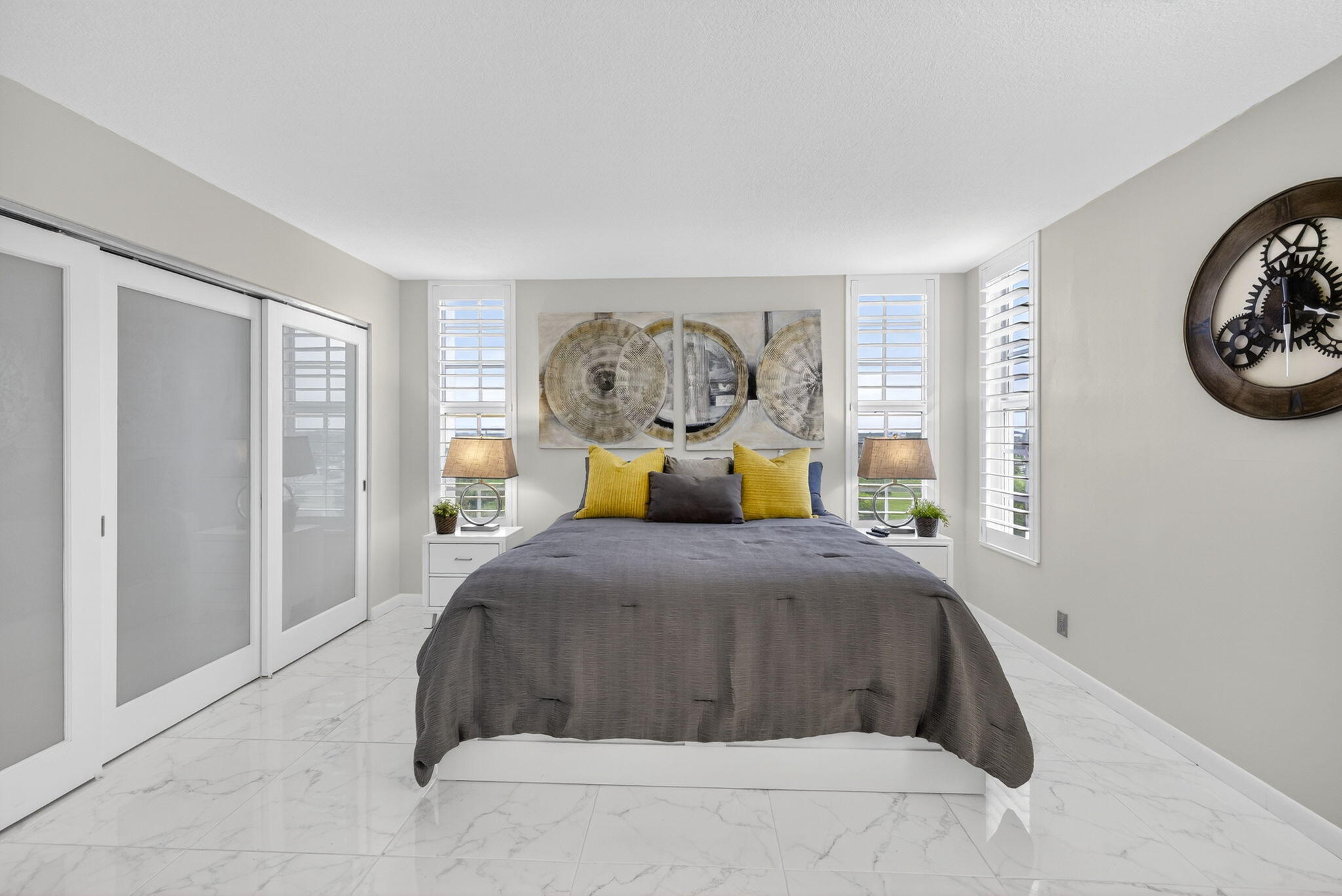 3091 North Course Drive, Unit 710 Pompano Beach, FL 33069 - Photo 27 of 46 a bedroom with a bed and a window