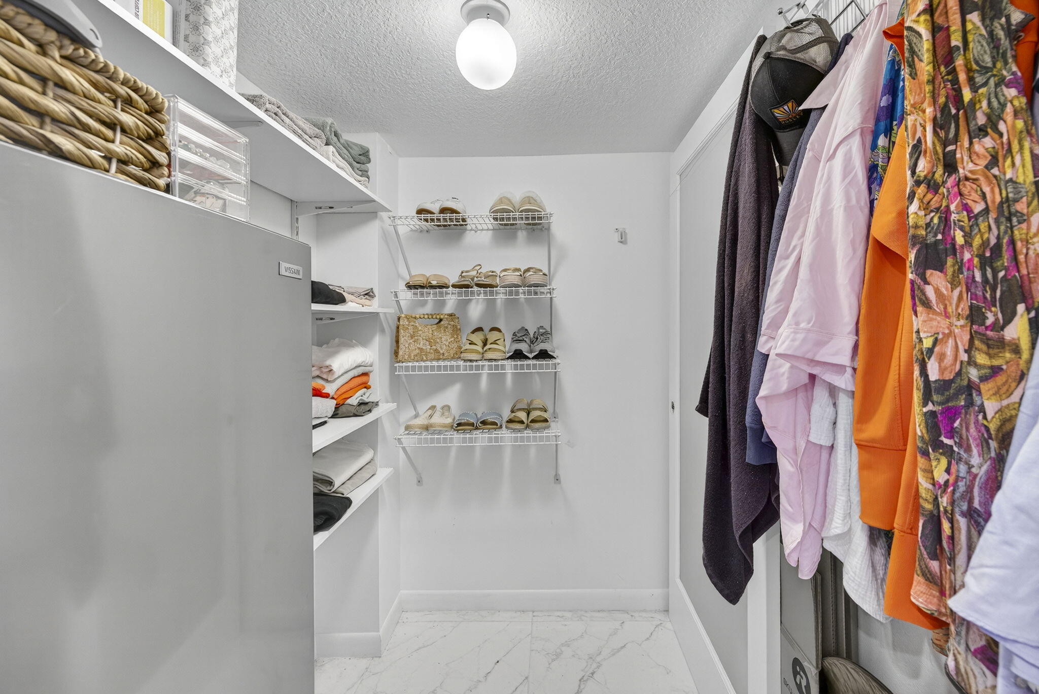 3091 North Course Drive, Unit 710 Pompano Beach, FL 33069 - Photo 33 of 46 a room with storage and utility