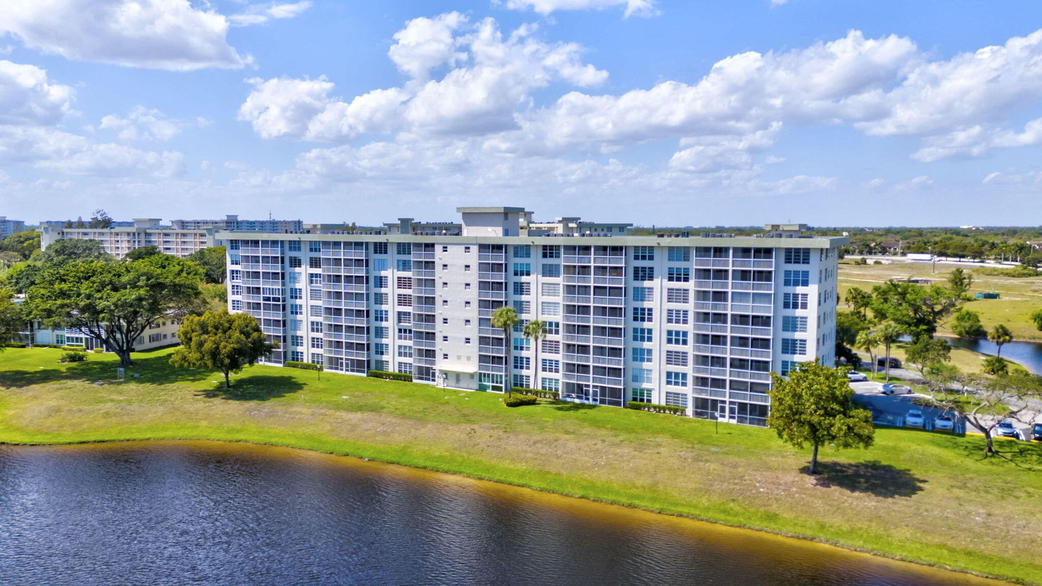 3091 North Course Drive, Unit 710 Pompano Beach, FL 33069 - Photo 38 of 46 a view of a city with tall buildings