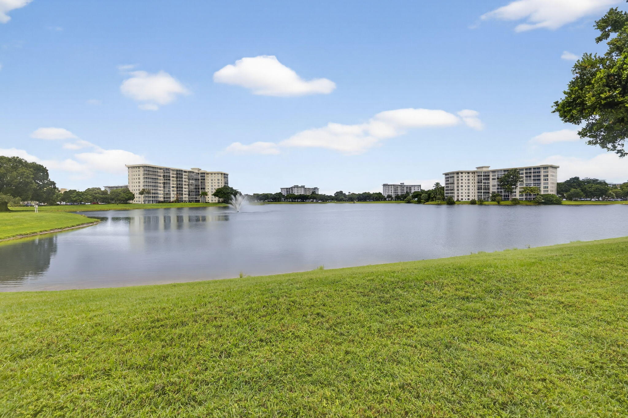 3091 North Course Drive, Unit 710 Pompano Beach, FL 33069 - Photo 39 of 46 a view of a lake