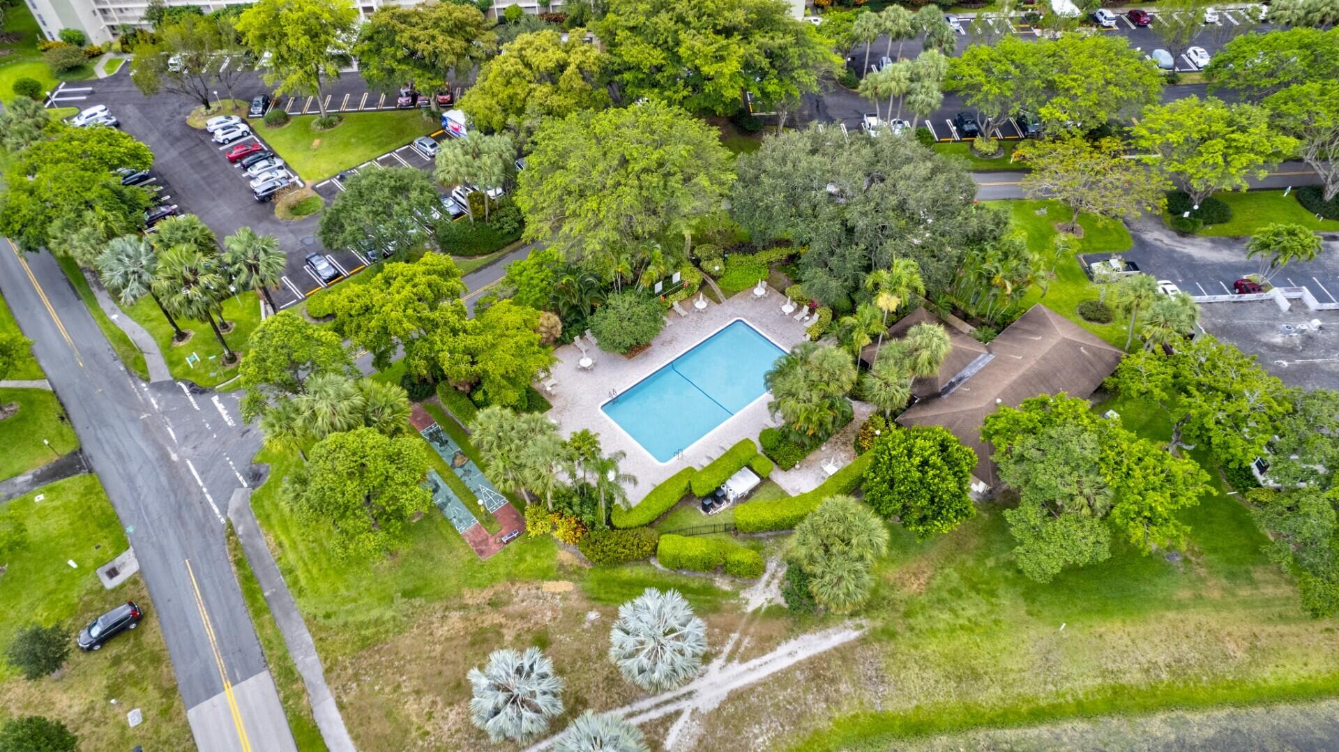 3091 North Course Drive, Unit 710 Pompano Beach, FL 33069 - Photo 45 of 46 a view of a garden