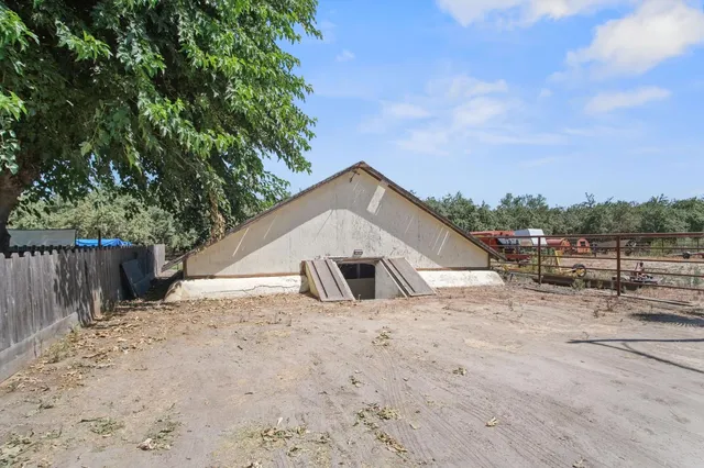 a view of a car parked in front of a house