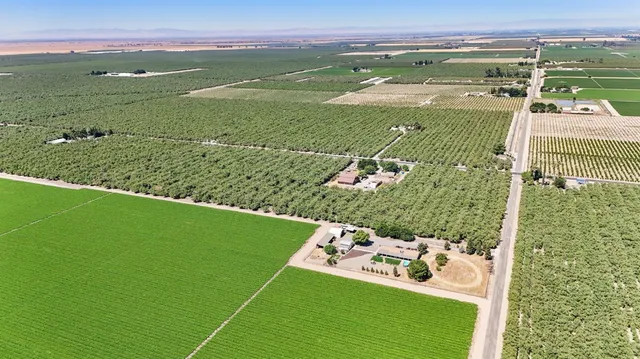 a view of a lake with a big yard