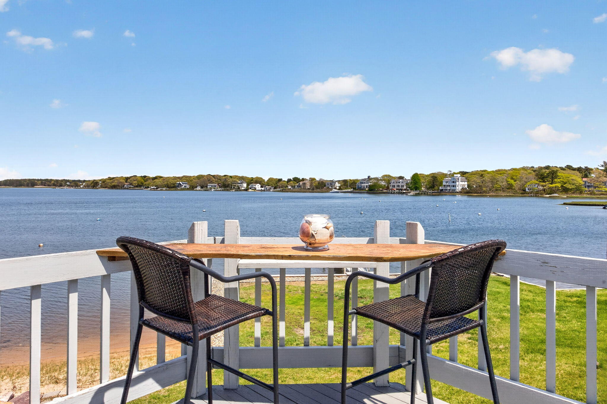 11 Clamshell Lane Mashpee, MA 02649 - Photo 9 of 43 a terrace of a house with outdoor seating