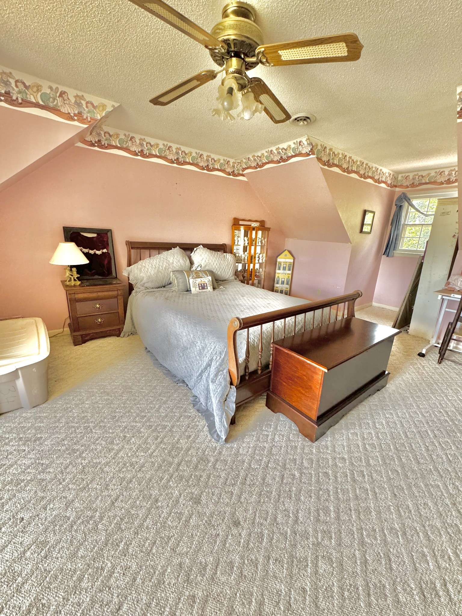 380 Lanning Road Lawrenceburg, TN 38464 - Photo 24 of 54 a spacious bedroom with a bed and a table