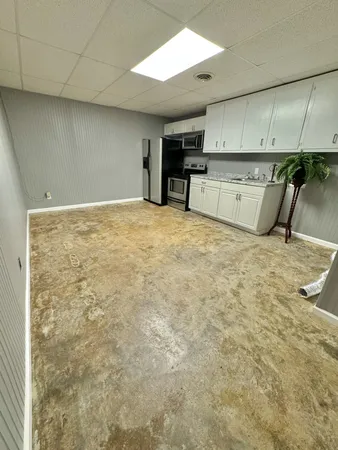 a view of a kitchen with a sink