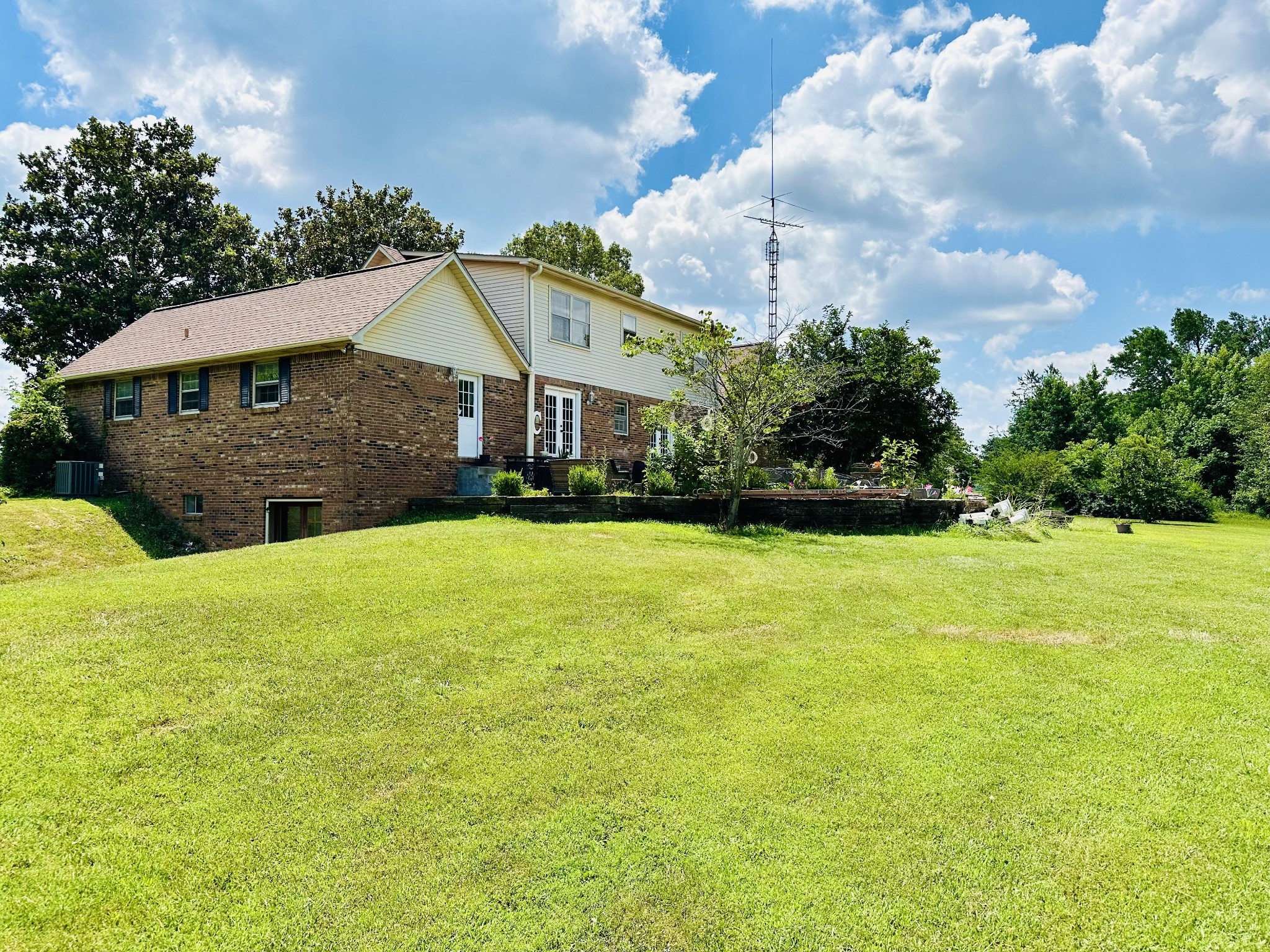 380 Lanning Road Lawrenceburg, TN 38464 - Photo 42 of 54 a view of a house with a yard