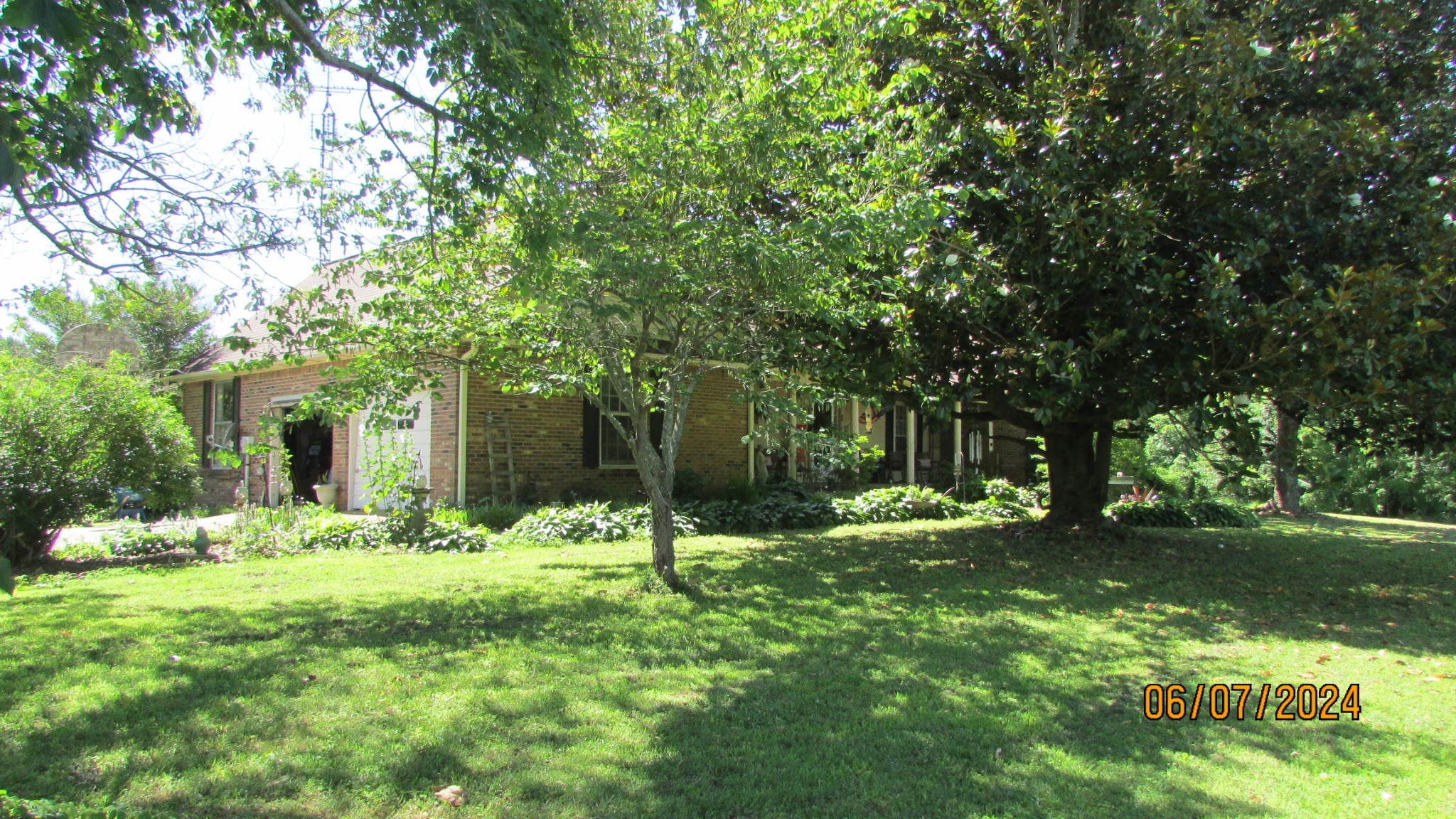 380 Lanning Road Lawrenceburg, TN 38464 - Photo 43 of 54 a view of a house with a yard