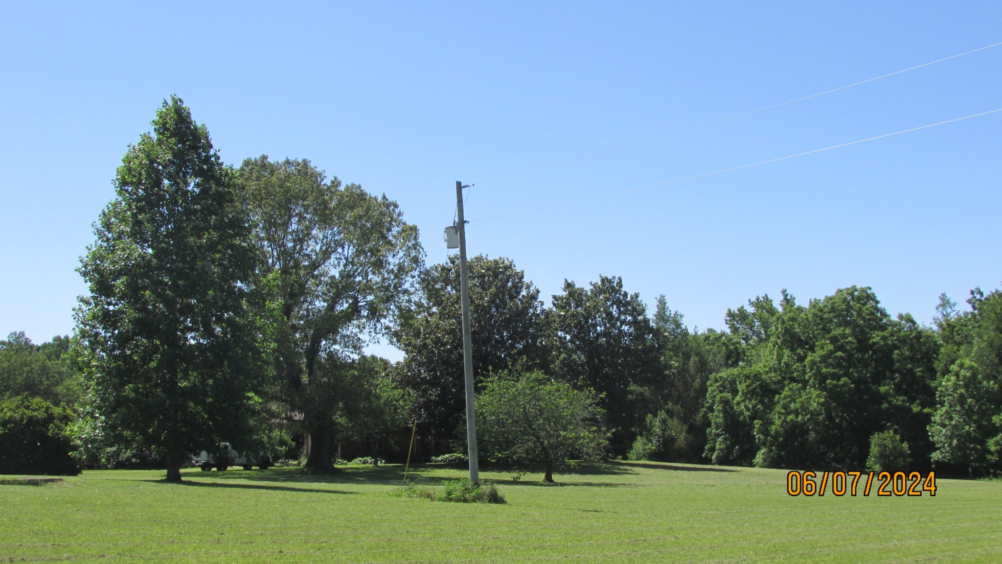 380 Lanning Road Lawrenceburg, TN 38464 - Photo 50 of 54 a backyard of a house with lots of green space