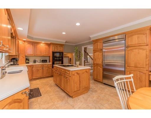 31 Sandy Pine Road Templeton, MA 01468 - Photo 3 of 25 a open kitchen with cabinets a sink and a stove