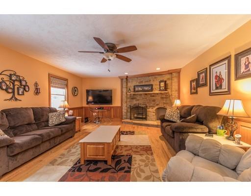31 Sandy Pine Road Templeton, MA 01468 - Photo 9 of 25 a living room with fireplace furniture and a flat screen tv