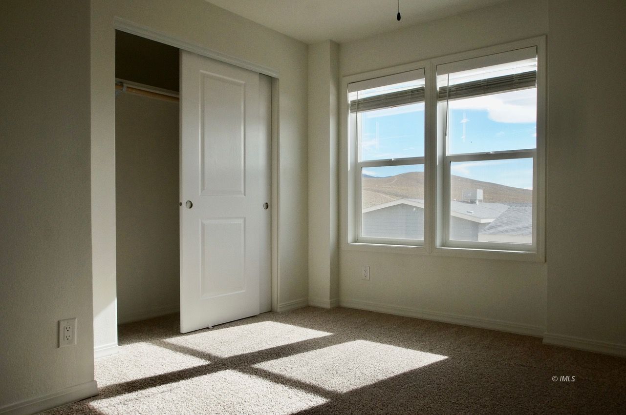 161 Tuolumne Road Bishop, CA 93514 - Photo 14 of 23 an empty room with windows
