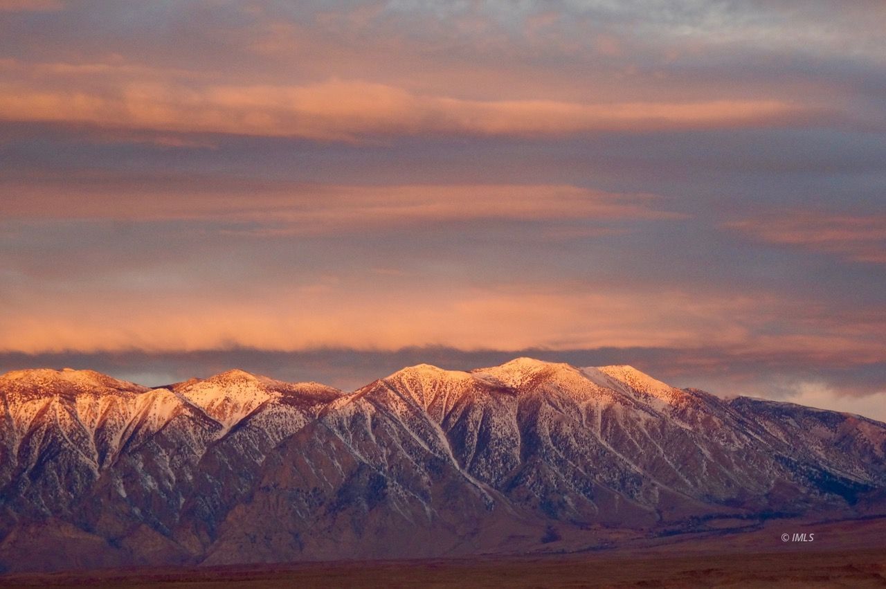 161 Tuolumne Road Bishop, CA 93514 - Photo 18 of 23 a view of a ocean with sunset