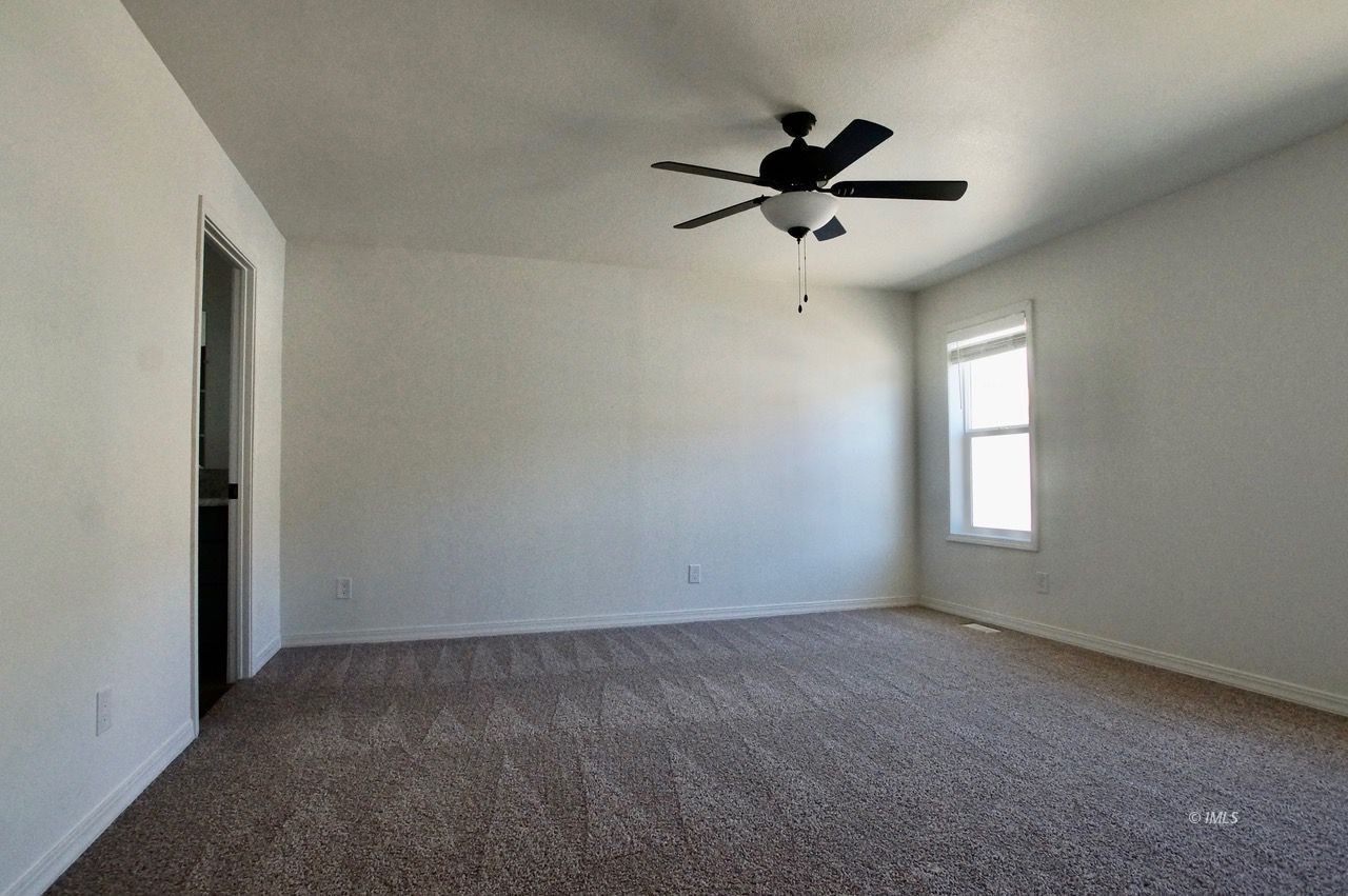 161 Tuolumne Road Bishop, CA 93514 - Photo 8 of 23 a view of room with a ceiling fan