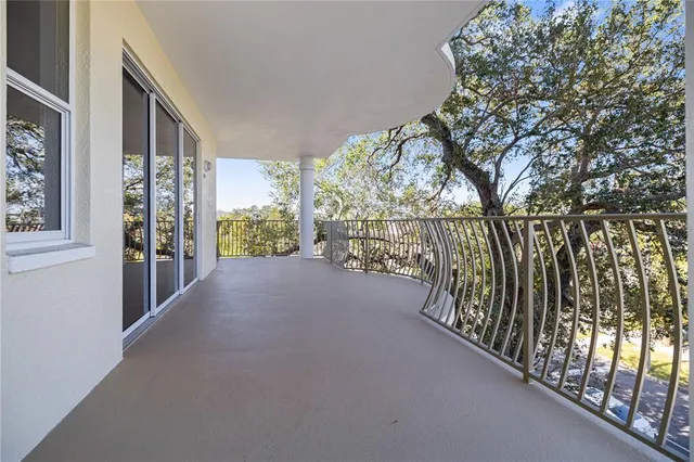 a view of entryway with wooden stairs