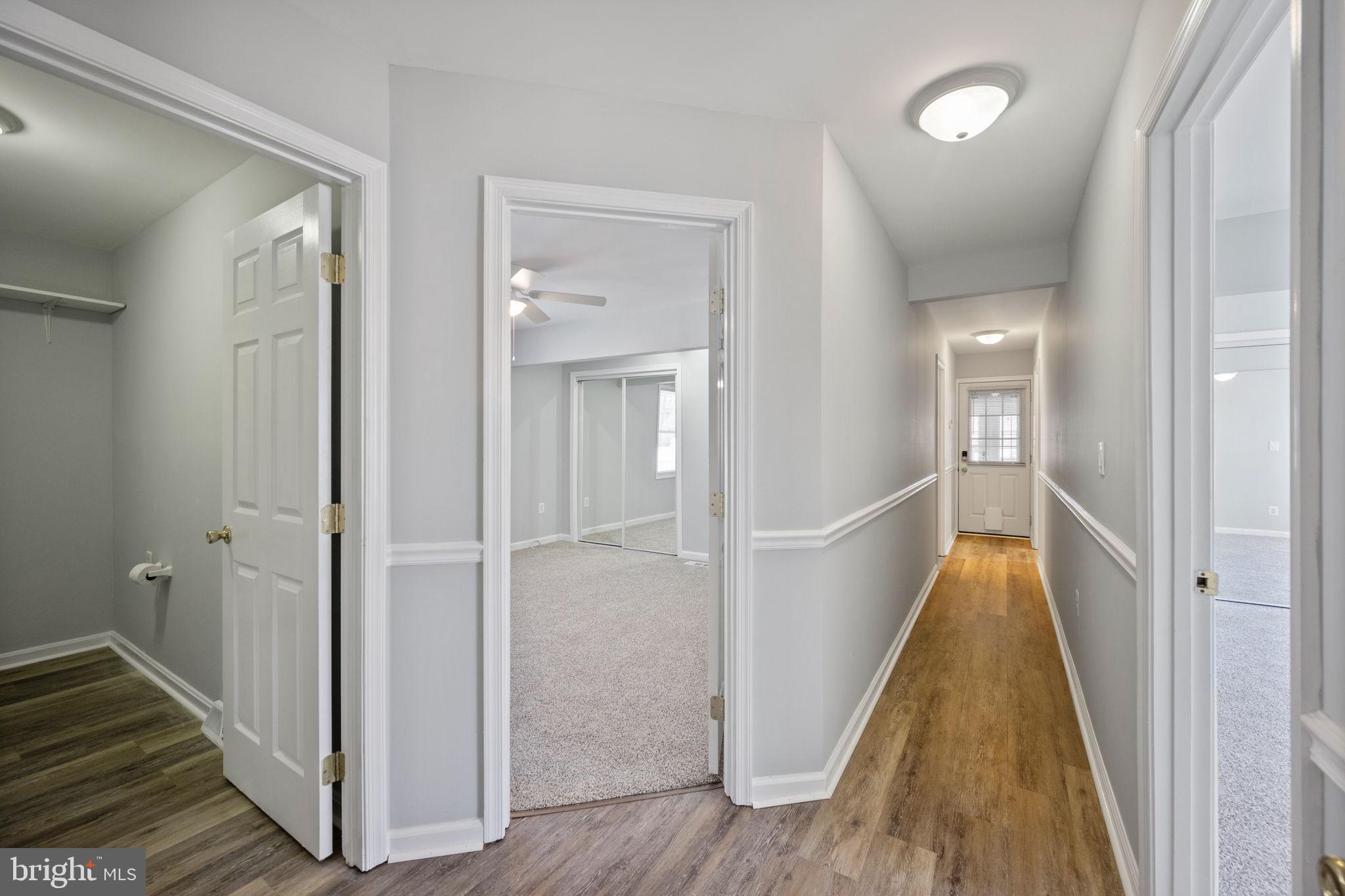 8626 Wise Avenue Baltimore, MD 21222 - Photo 19 of 57 a view of hallway with wooden floor
