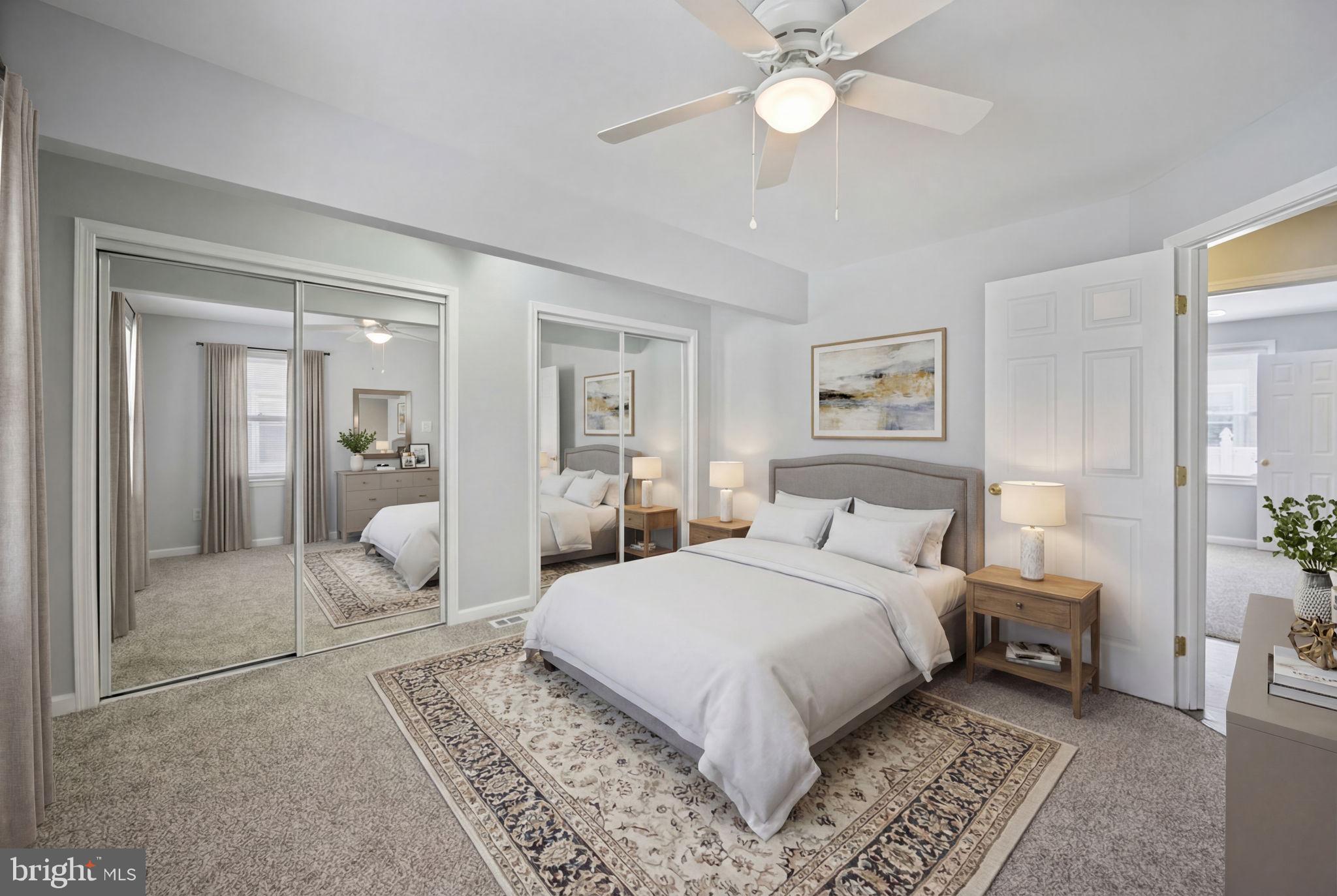 8626 Wise Avenue Baltimore, MD 21222 - Photo 20 of 57 a bedroom with a large bed and a chandelier