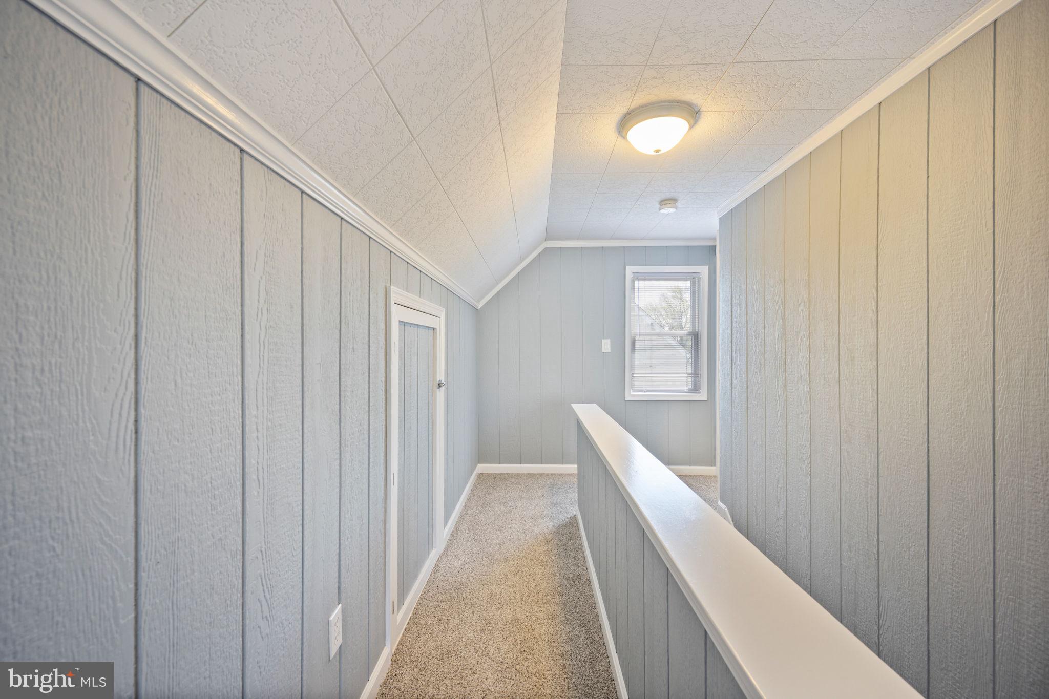 8626 Wise Avenue Baltimore, MD 21222 - Photo 29 of 57 a view of a hallway with closet