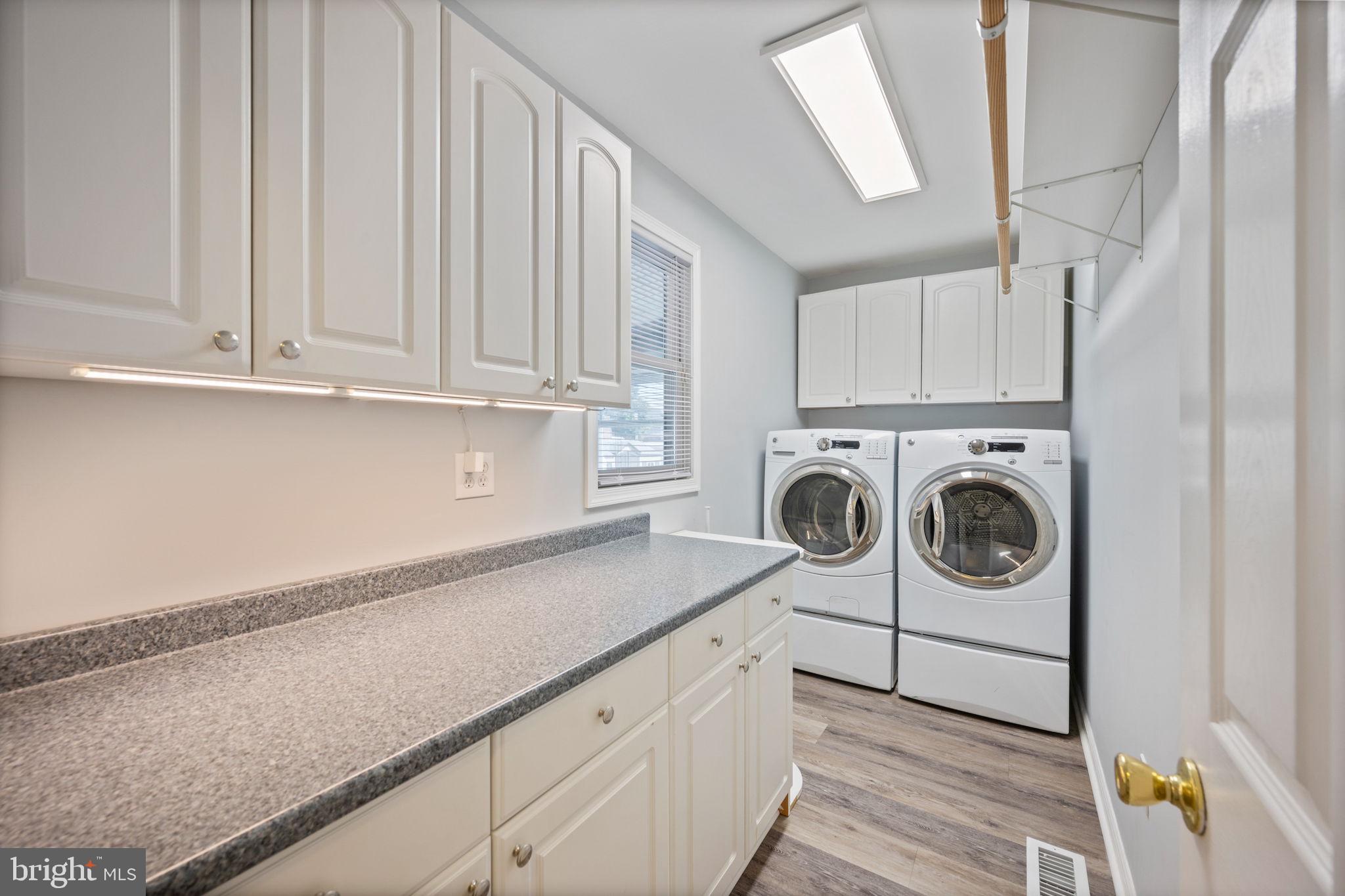 8626 Wise Avenue Baltimore, MD 21222 - Photo 35 of 57 a utility room with dryer and washer