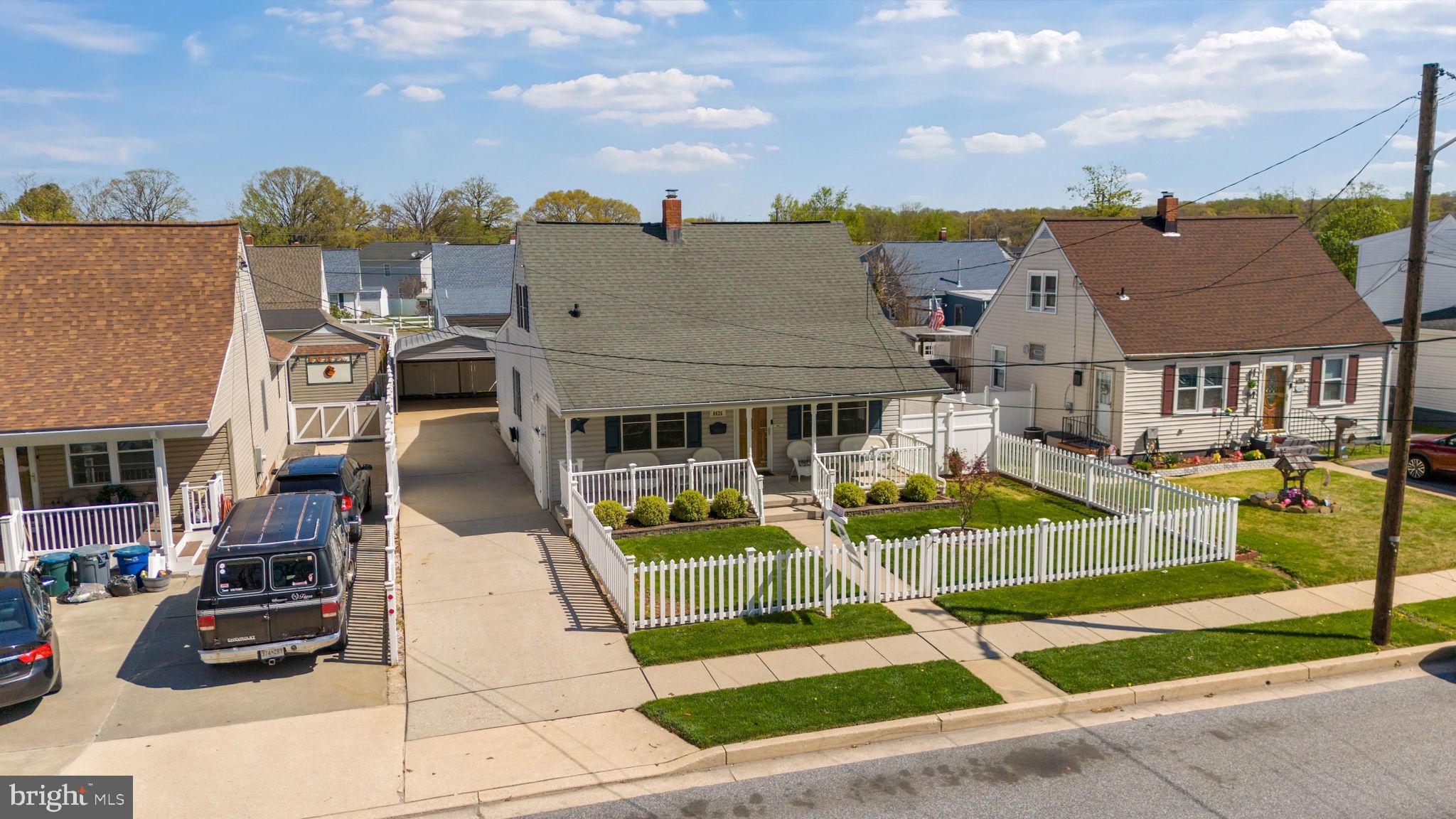 8626 Wise Avenue Baltimore, MD 21222 - Photo 52 of 57 a view of multiple houses with a yard