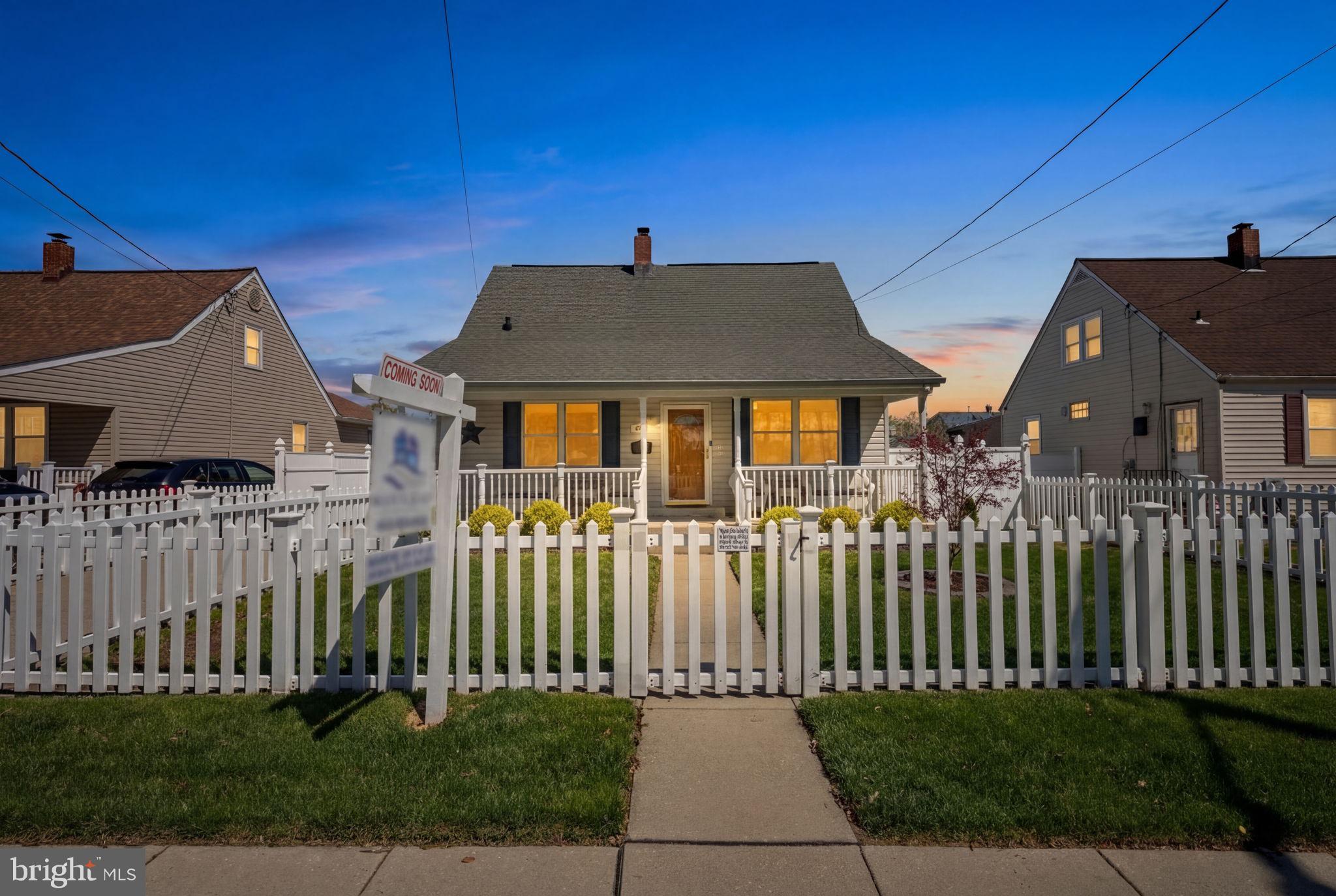 8626 Wise Avenue Baltimore, MD 21222 - Photo 55 of 57 a front view of a house with a garden