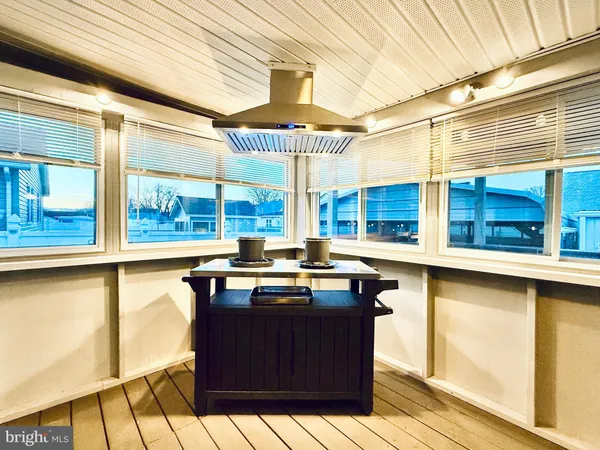 a kitchen with a sink and a window