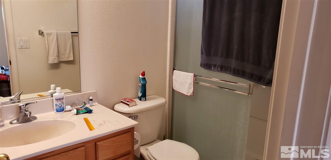85 Calistoga Court Reno, NV 89508 - Photo 11 of 23 a bathroom with a sink and toilet