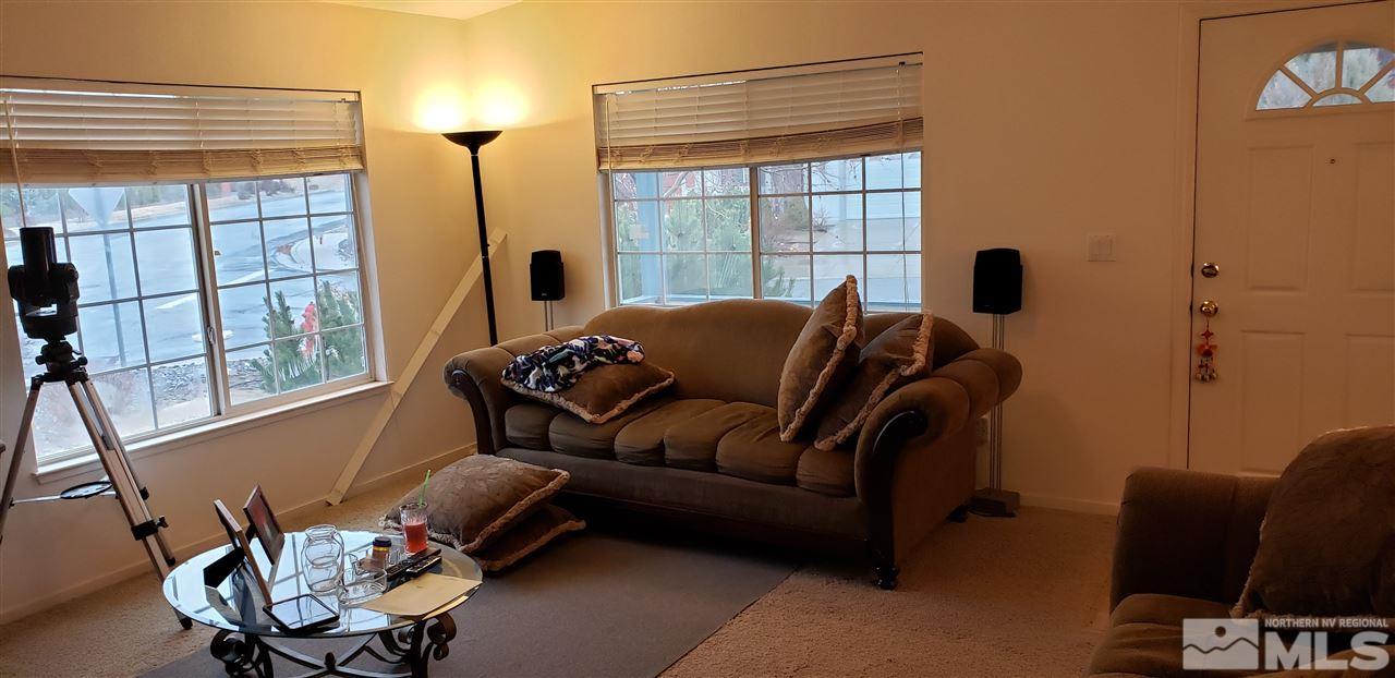 85 Calistoga Court Reno, NV 89508 - Photo 2 of 23 a living room with furniture and a window