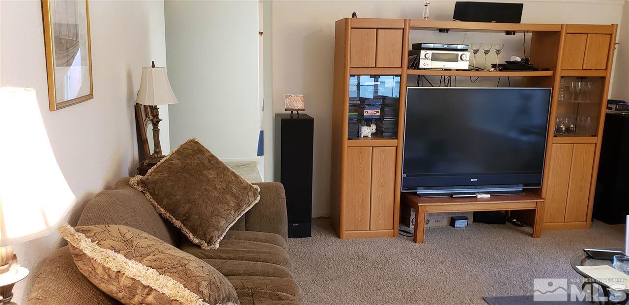 85 Calistoga Court Reno, NV 89508 - Photo 23 of 23 a living room with furniture and a flat screen tv