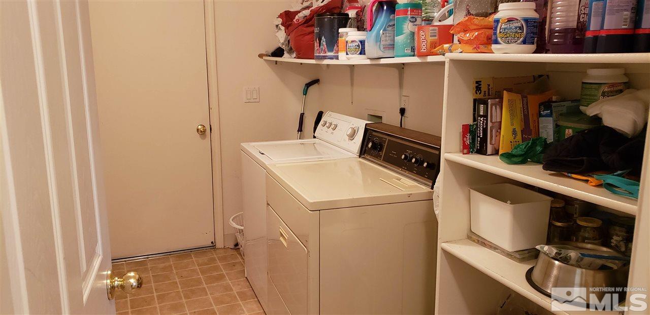 85 Calistoga Court Reno, NV 89508 - Photo 7 of 23 a utility room with dryer and washer