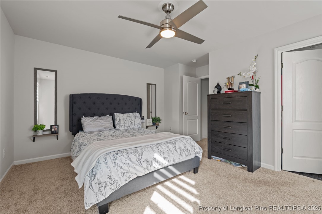 287 Hallow Oak Street Spring Lake, NC 28390 - Photo 24 of 37 a bedroom with a bed and a dresser
