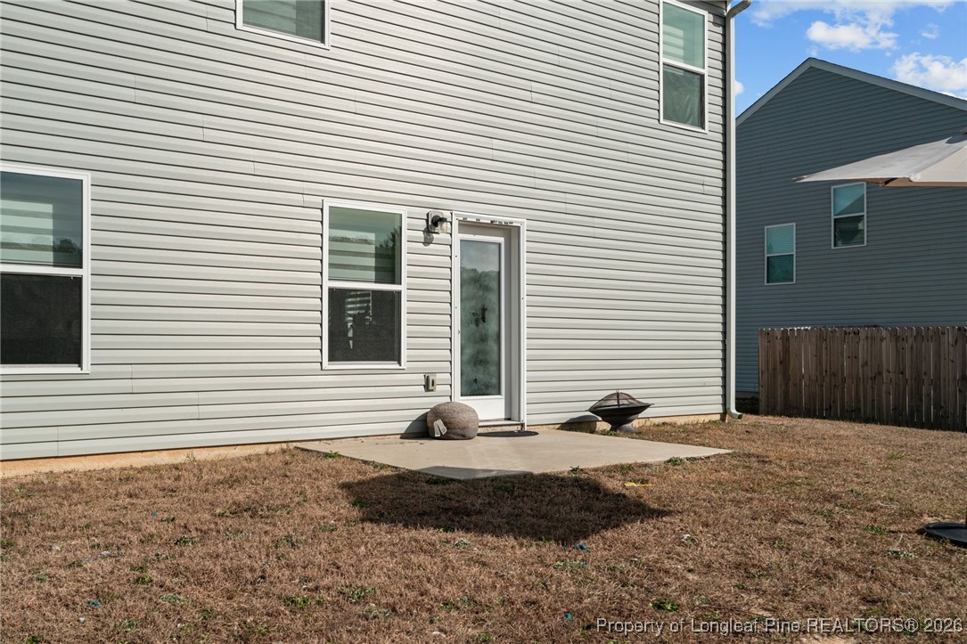 287 Hallow Oak Street Spring Lake, NC 28390 - Photo 36 of 37 a view of a house with a yard