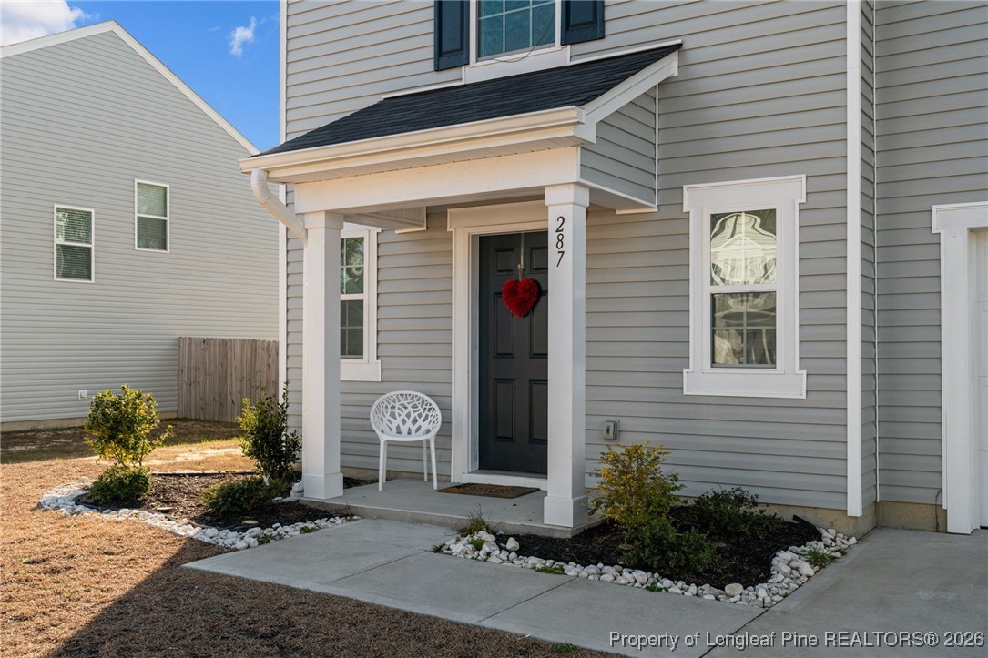 287 Hallow Oak Street Spring Lake, NC 28390 - Photo 5 of 37 a front view of a house with a yard