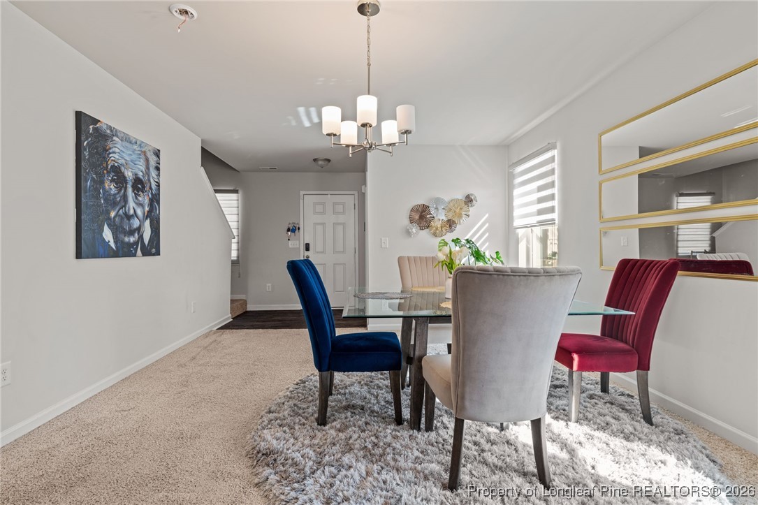 287 Hallow Oak Street Spring Lake, NC 28390 - Photo 8 of 37 a view of a dining room with furniture