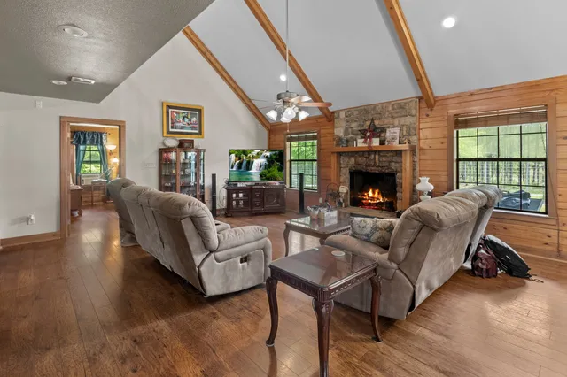 a kitchen with stainless steel appliances granite countertop a sink and cabinets