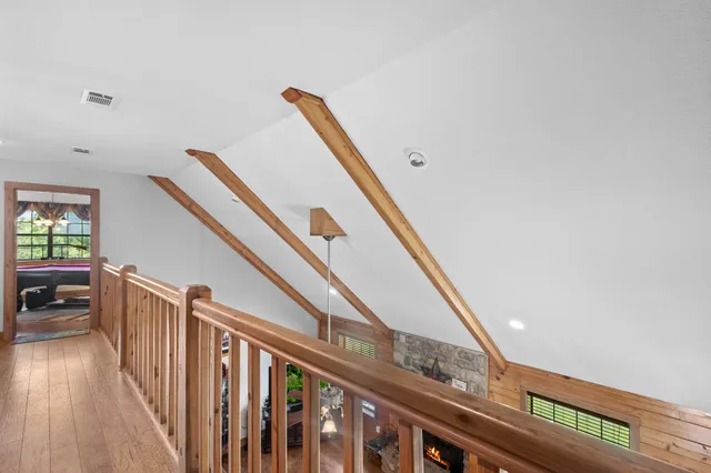 a white bath tub sitting next to a white toilet