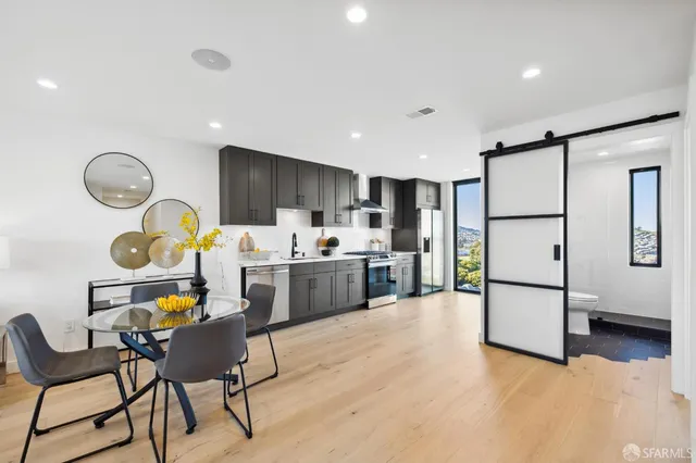 a bathroom with a shower and a toilet