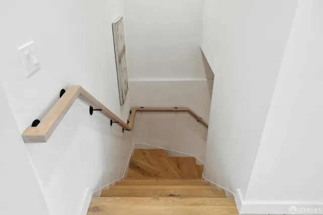 an aerial view of residential building with parking space