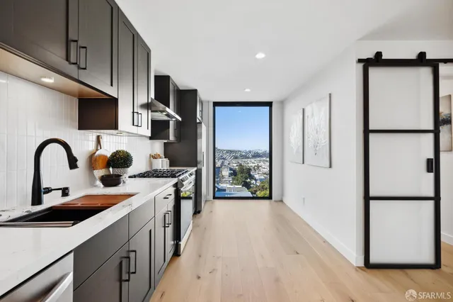 a view of a car garage with a door