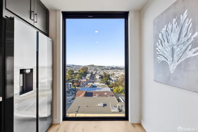 a stove top oven sitting inside of a kitchen