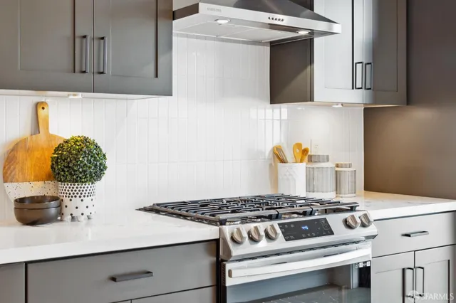 a bedroom with a bed and a large mirror