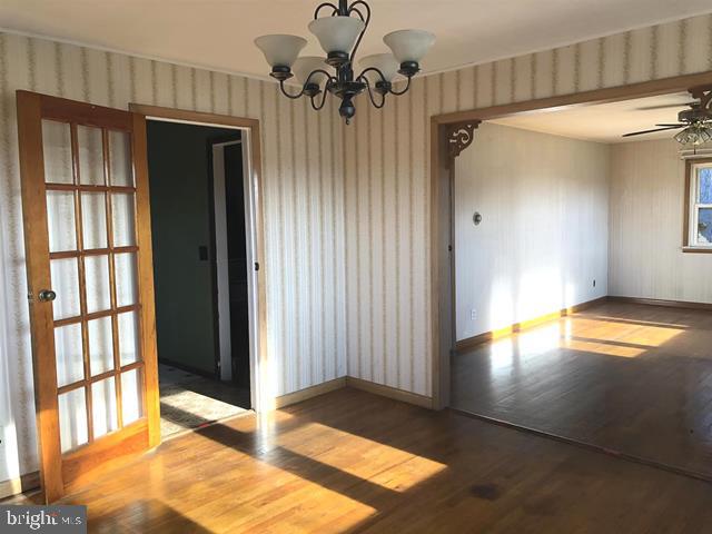 472 Richards Road Bridgeton, NJ 08302 - Photo 7 of 21 a view of empty room with a window and ceiling fan