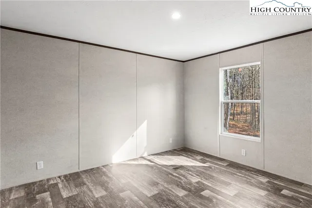 a bathroom with a granite countertop sink a toilet and bathtub