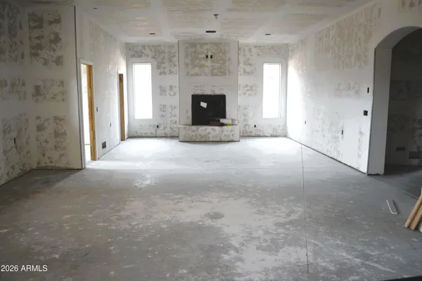 an empty room with windows