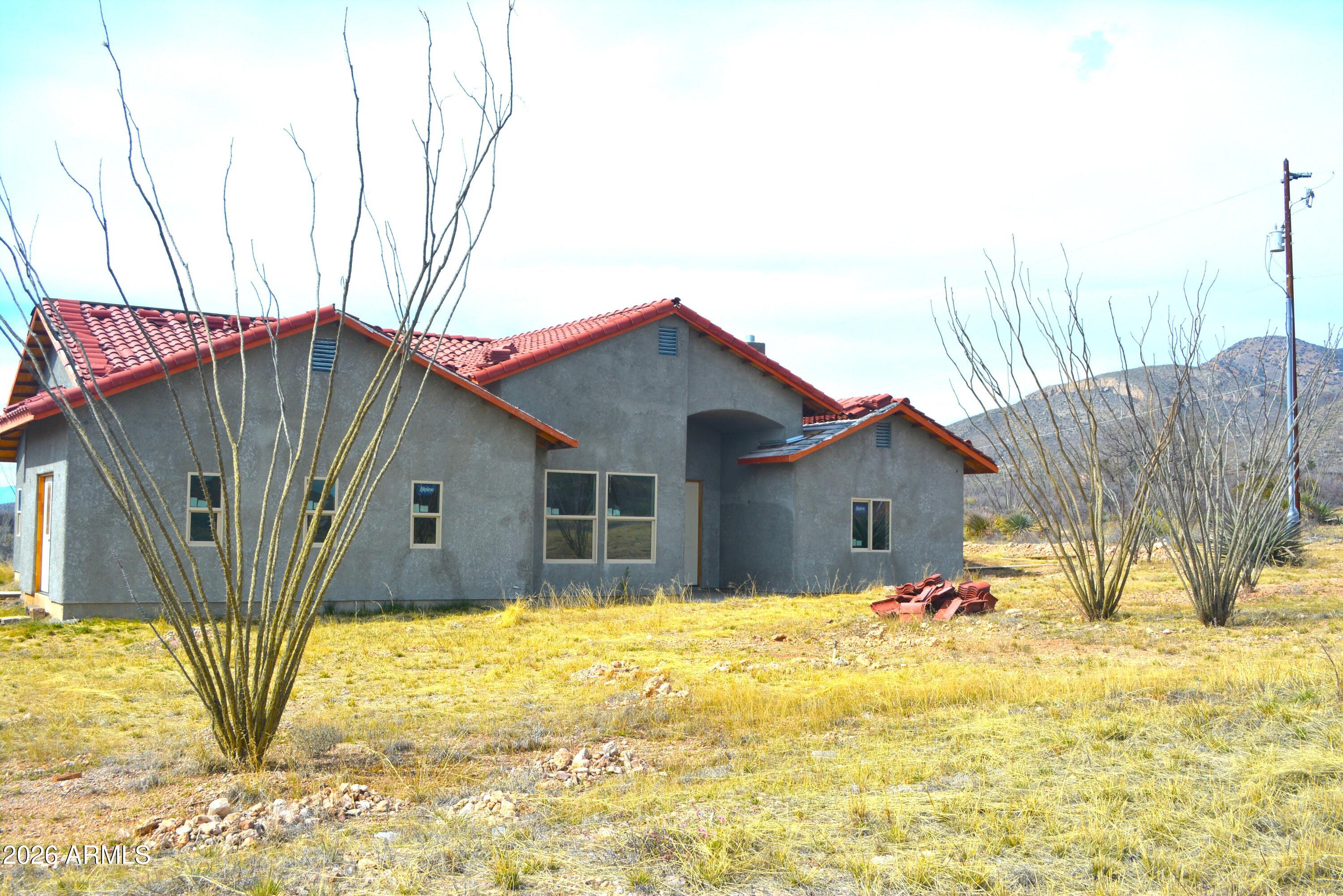 994 South Coy Street Bisbee, AZ 85603 - Photo 2 of 39 a house view with a outdoor space