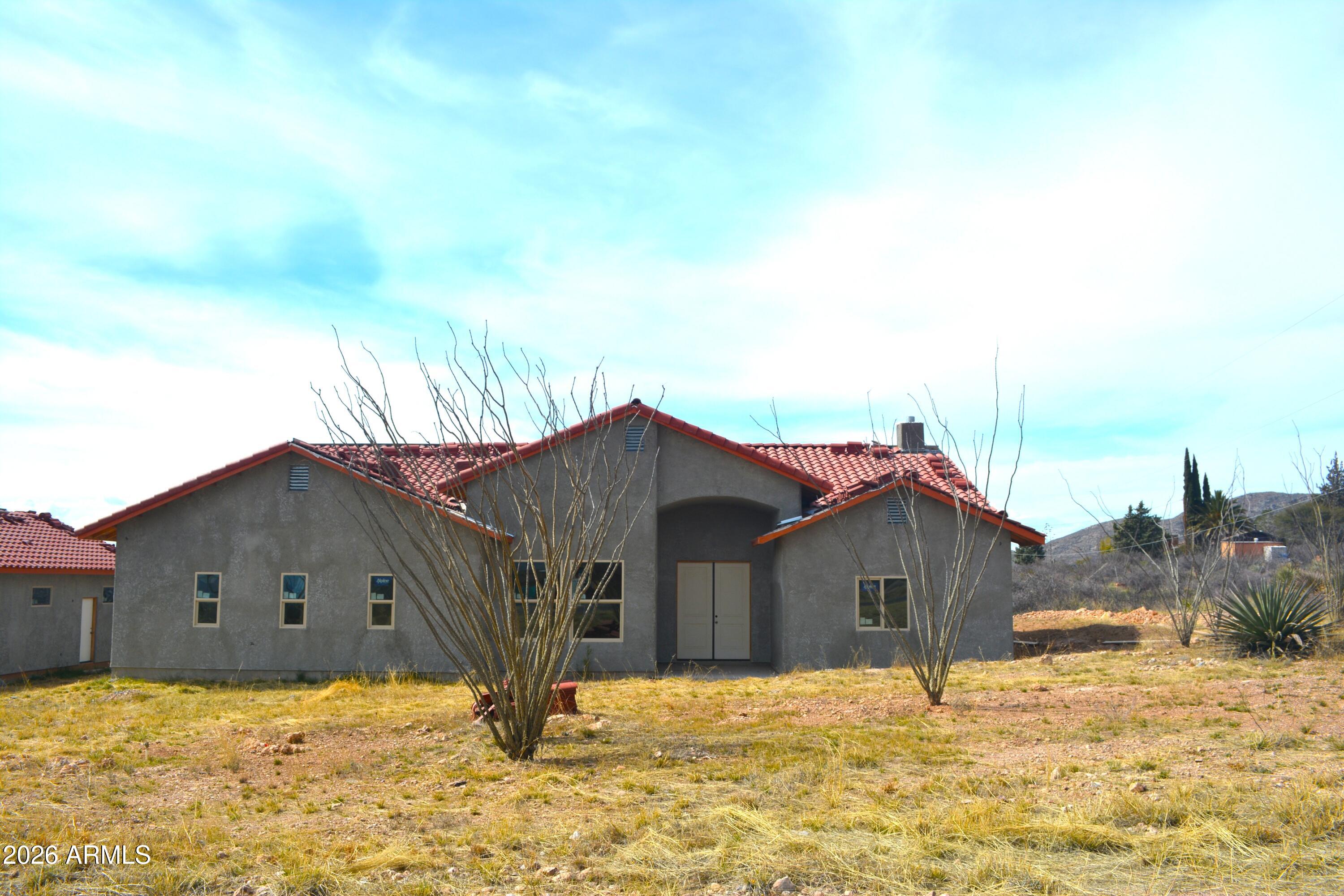 994 South Coy Street Bisbee, AZ 85603 - Photo 3 of 39 a house with yard in front of it