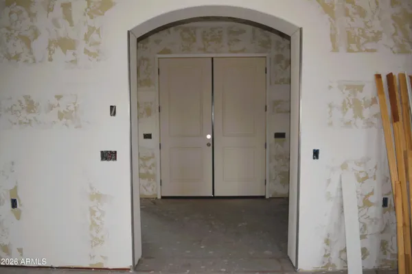 a view of a livingroom with furniture and windows