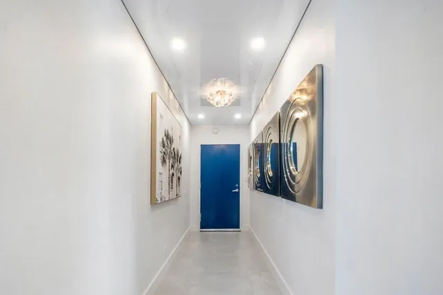 a view of a hallway with entryway