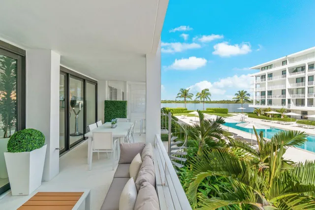 a view of a swimming pool and lounge chair